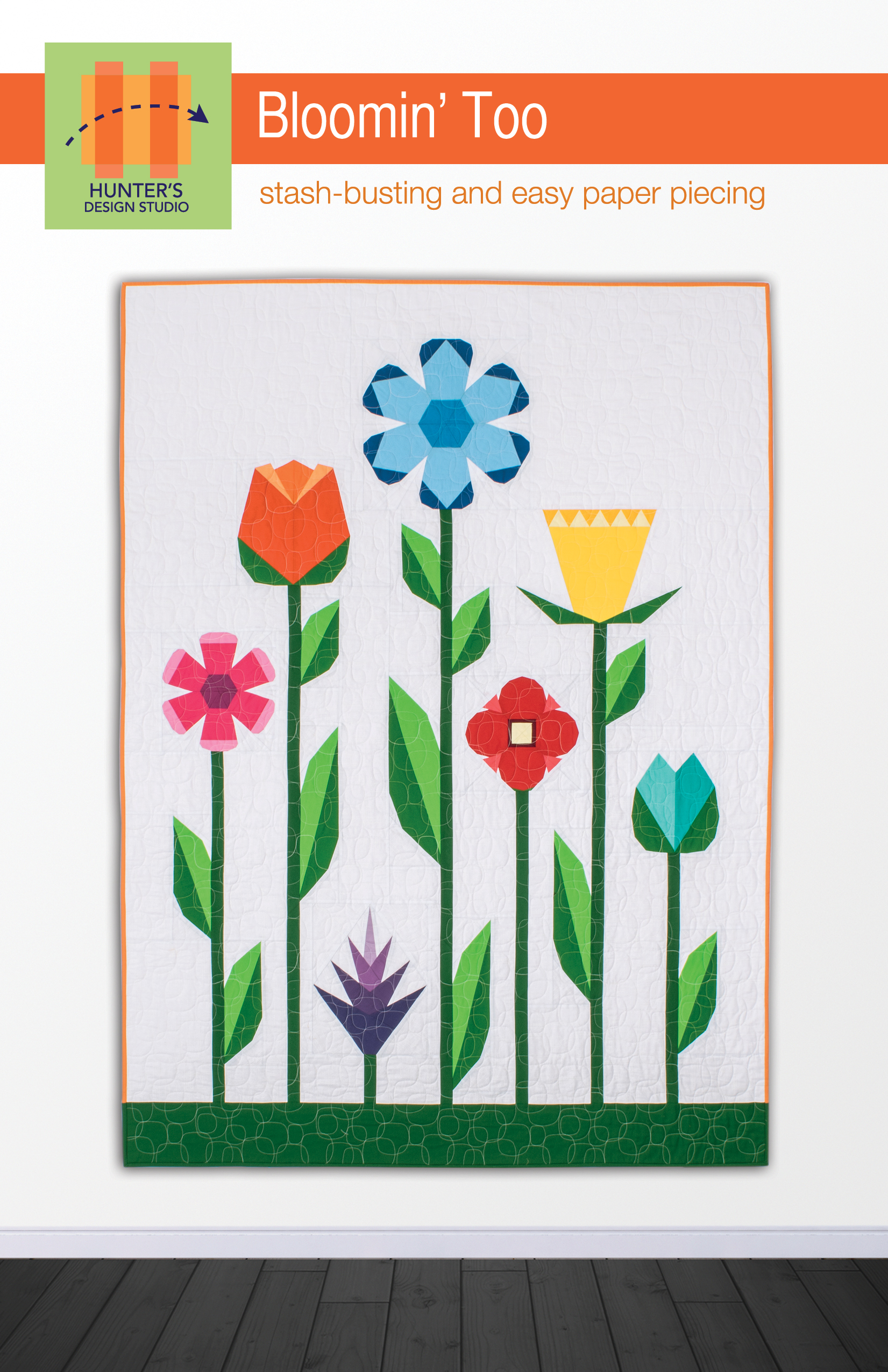 Bloomin' Too is a quilt pattern that features seven flowers made with foundation paper piecing.