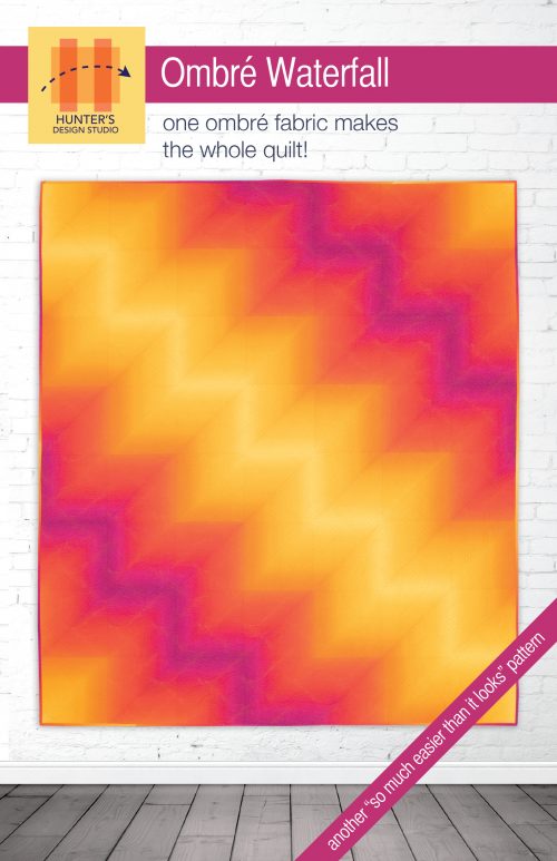 Ombré waterfall is a quilt made with ombre fabric sewn together in half square triangles that make color zig zag across the top of the quilt.