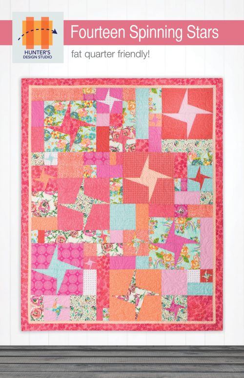 Fourteen Spinning Stars is a fat quarter friendly quilt that uses squares, rectangles and triangles to create spinning stars.