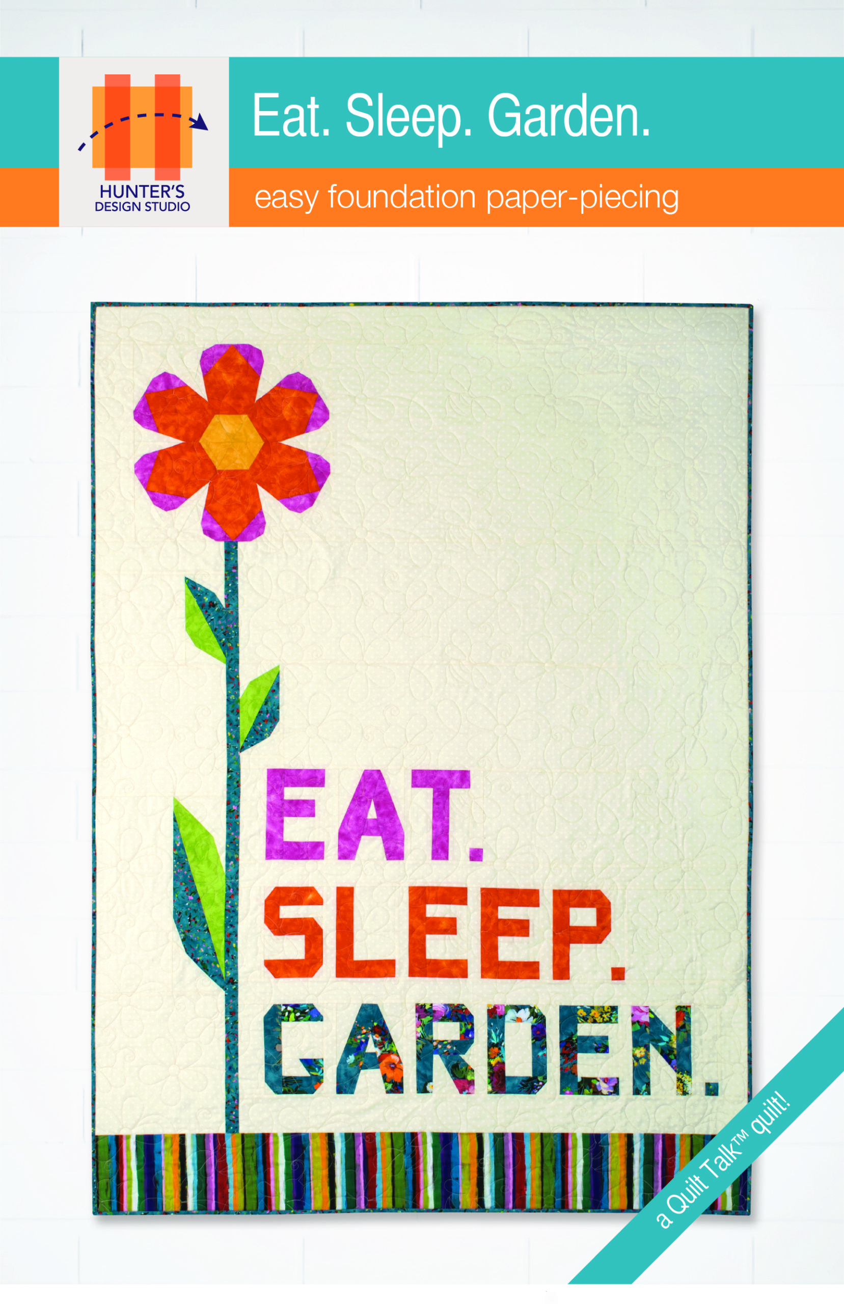 Eat Sleep Garden features easy foundation paper-pieced letters and a flower make this cheerful floral quilt with a fun message for your favorite garden lover.