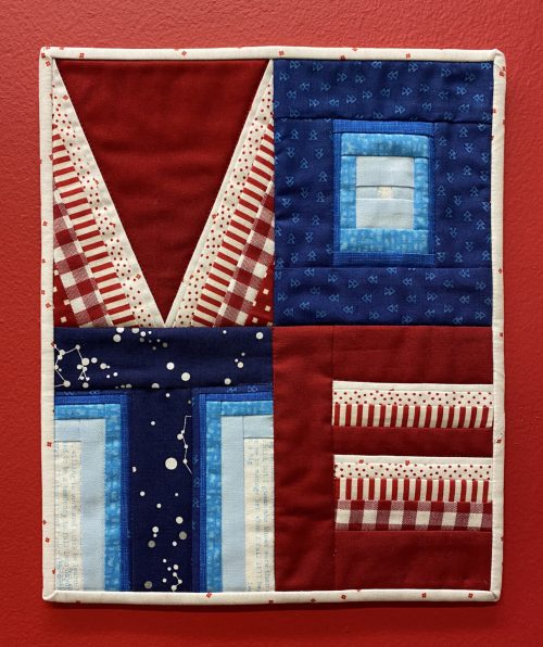 The Vote Mini quilt pattern is a quick and easy foundation paper piecing project you can make to motivate yourself and others to get out there and vote!