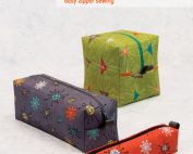 Chunky Wee Zippy Pouches features three different sizes of zippy pouches. One is long and thin - a pencil pouch, the other is rectangle shaped, and the third is cube shaped.