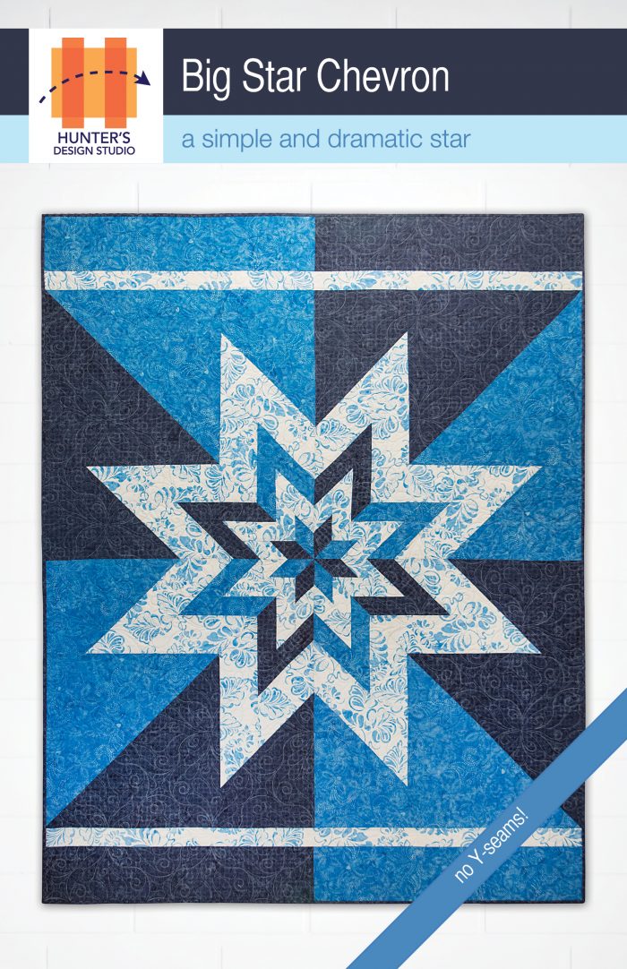 Big Star Chevron features a smaller chevron star inside a second, larger star. The background in the featured quilt is two colors, indicative of a chevron.