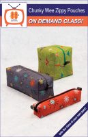 Image is of three sizes of the Chunky Wee Zippy Pouch. One is long and narrow in orange fabric, one is cube shaped in lime fabric, and the third is a large rectangle in grey fabric.